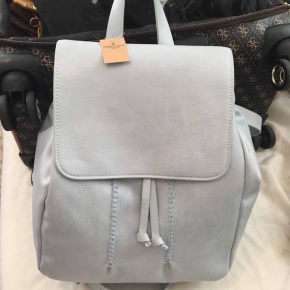 American Eagle Outfitters Handbags - NWT AEO Blue Faux Leather Braided Backpack O/S